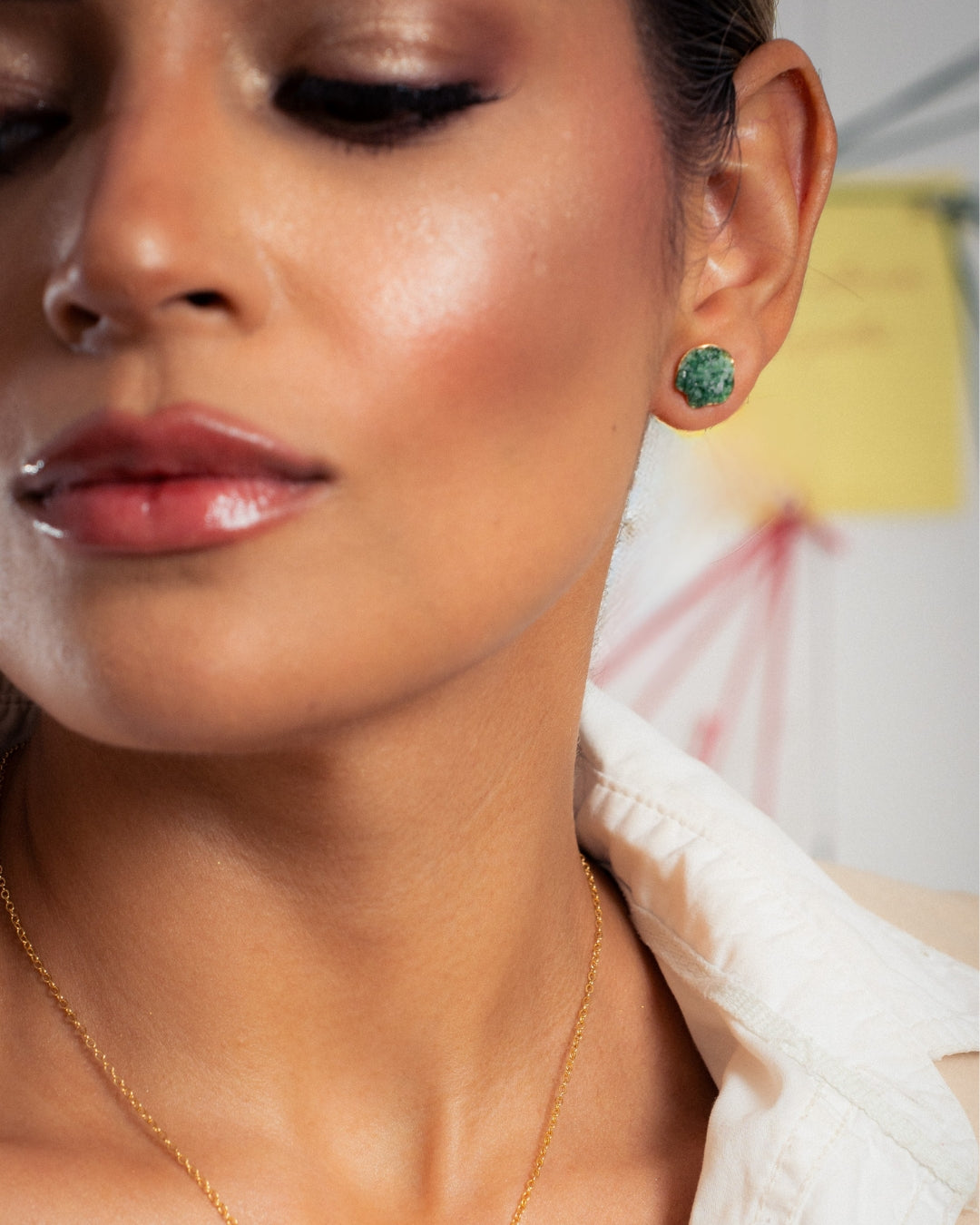 Aretes Topo pulso de esmeralda