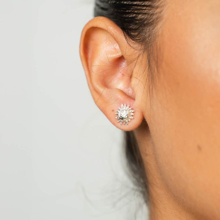 Aretes Sol de Rumbo Plateado