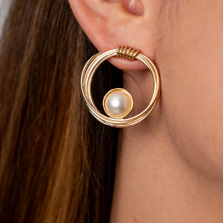 Aretes Custodia Serena